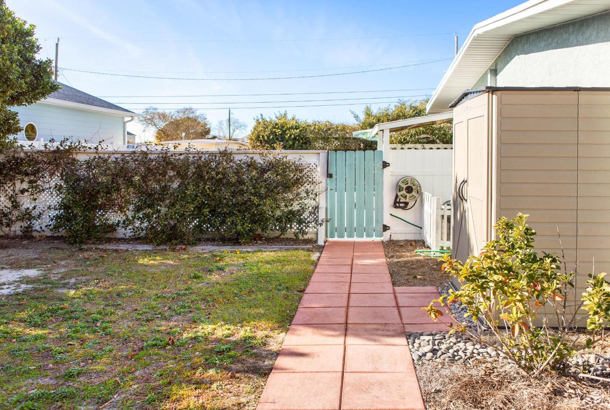 Holiday home Shells Family House Coastal Retreat With Private Pool Golf Cart & Steps To The